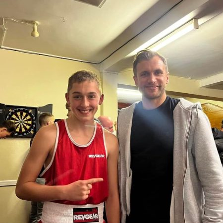 photo of coach tom stone with a fighter from abergavenny boxing club after a win