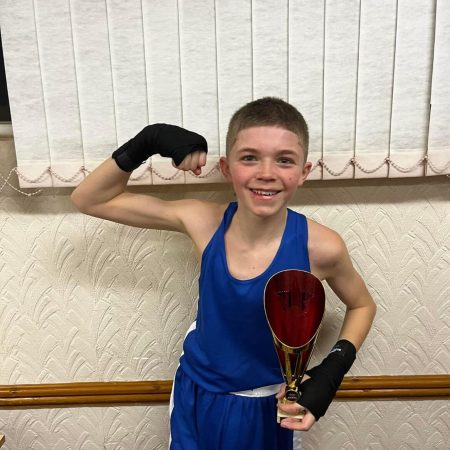 young fighter from abergavenny abc winning a trophy